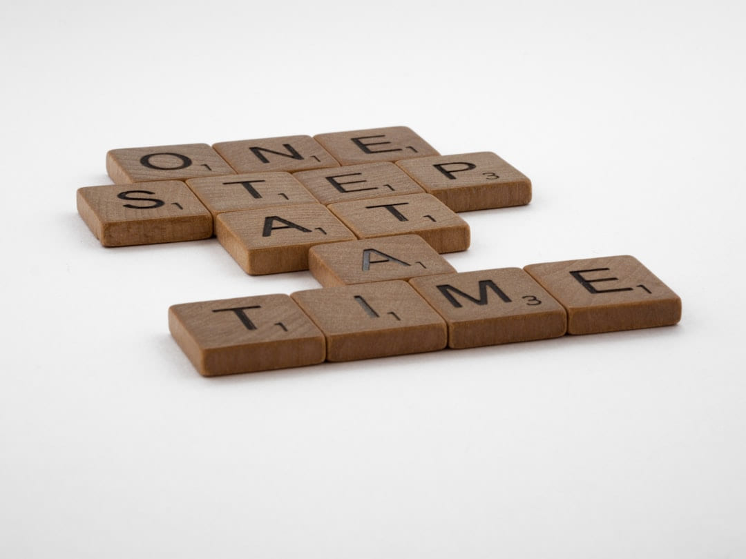 Letter tiles arranged to read one step at a time