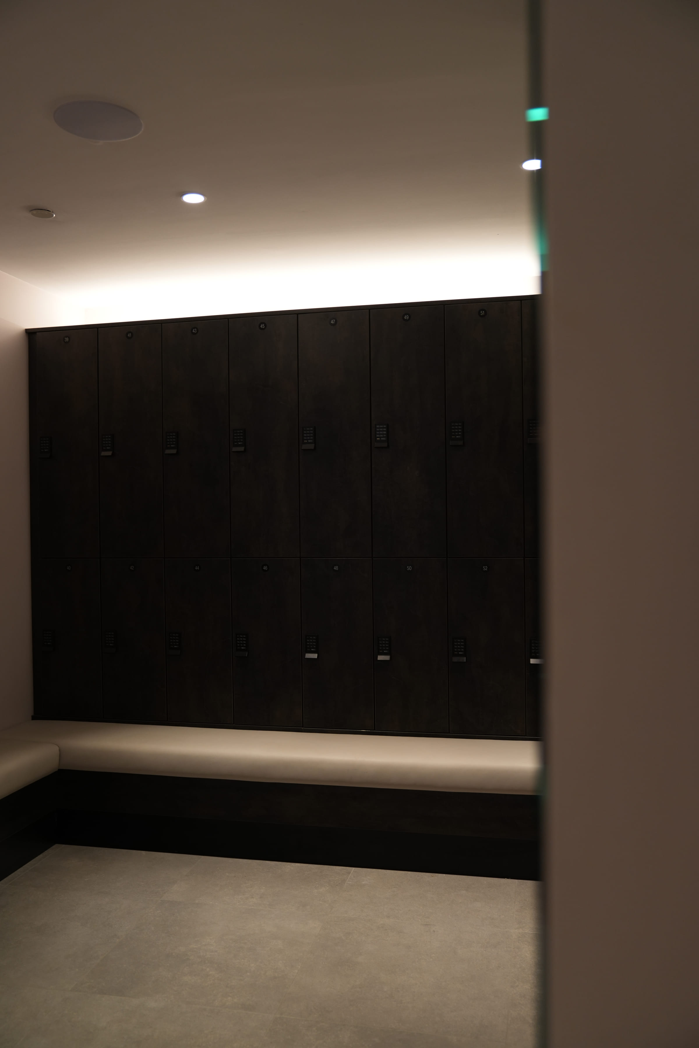 Lockers and a bench in the studio changing room