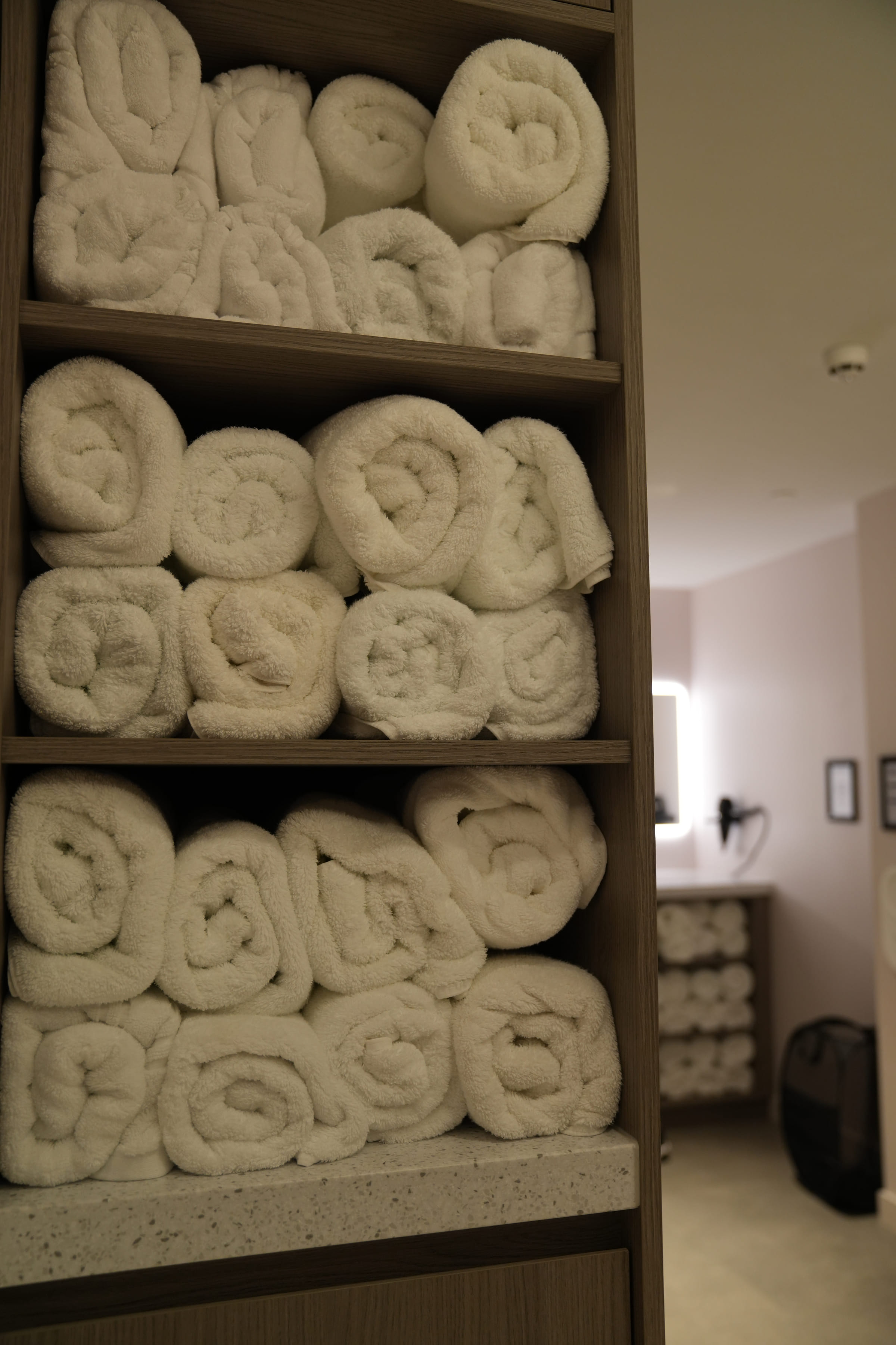 Rolled towels stacked in the studio's treatment room